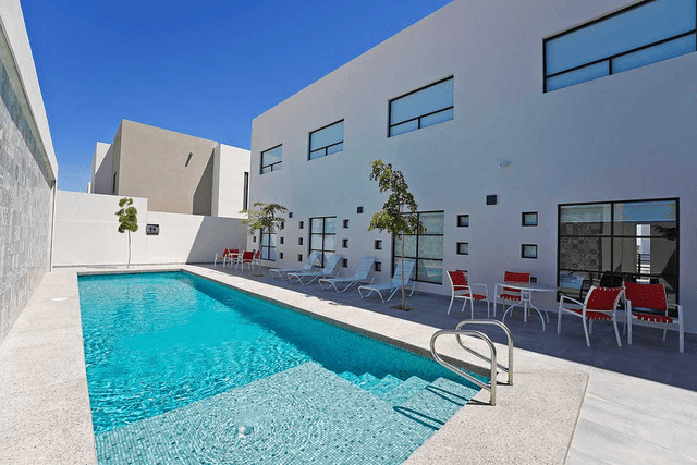 Inn at Laguna pool with sun loungers