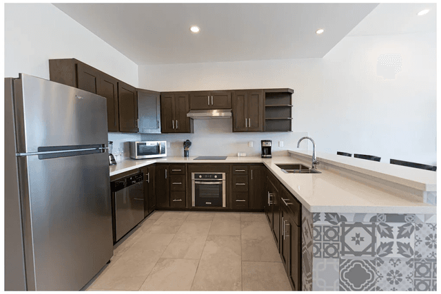 Ventanas Centro kitchen with stainless appliances