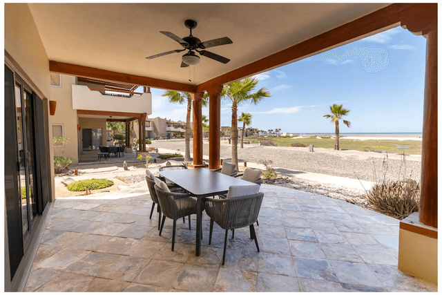 Villa Playa terrace with lounge chairs and ocean view