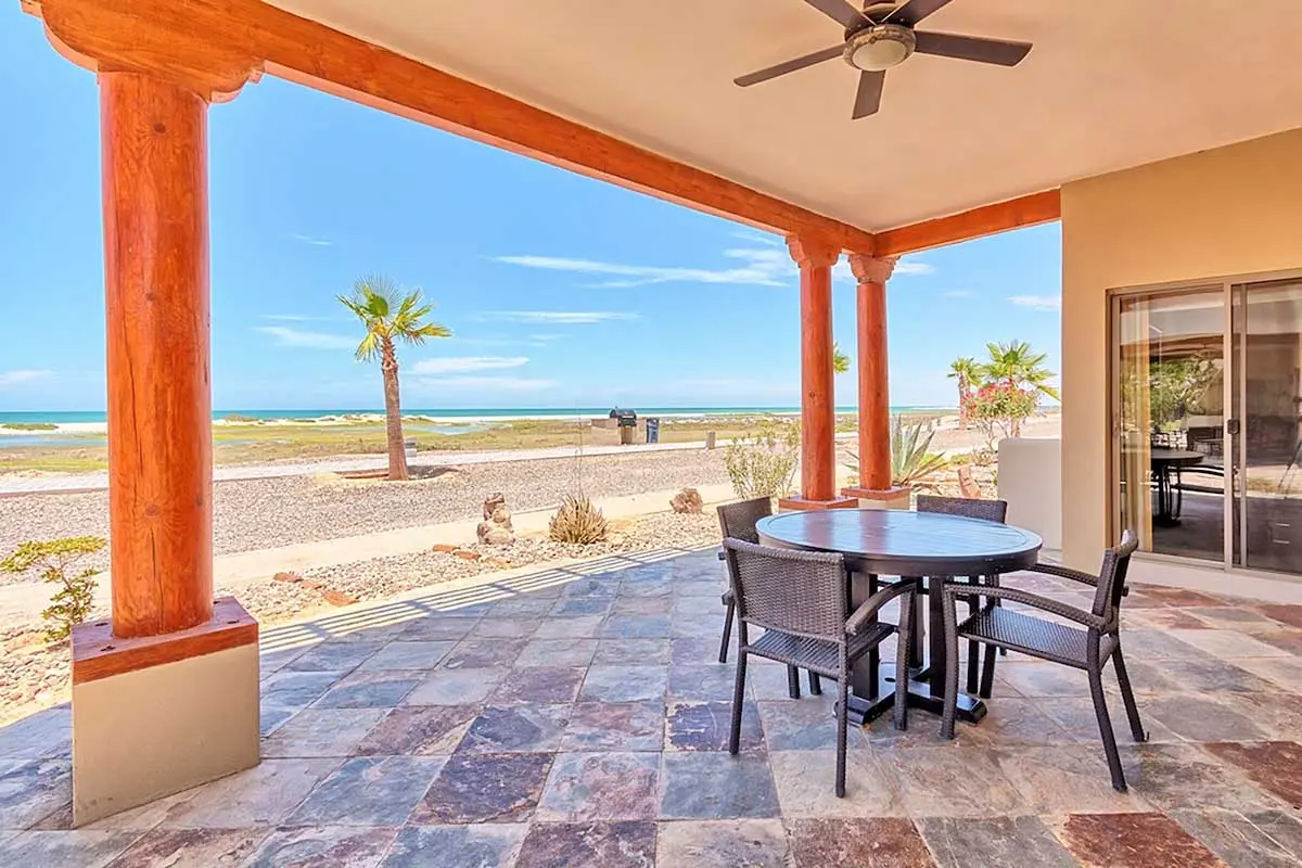 Villa Playa main patio with ocean view and outdoor seating