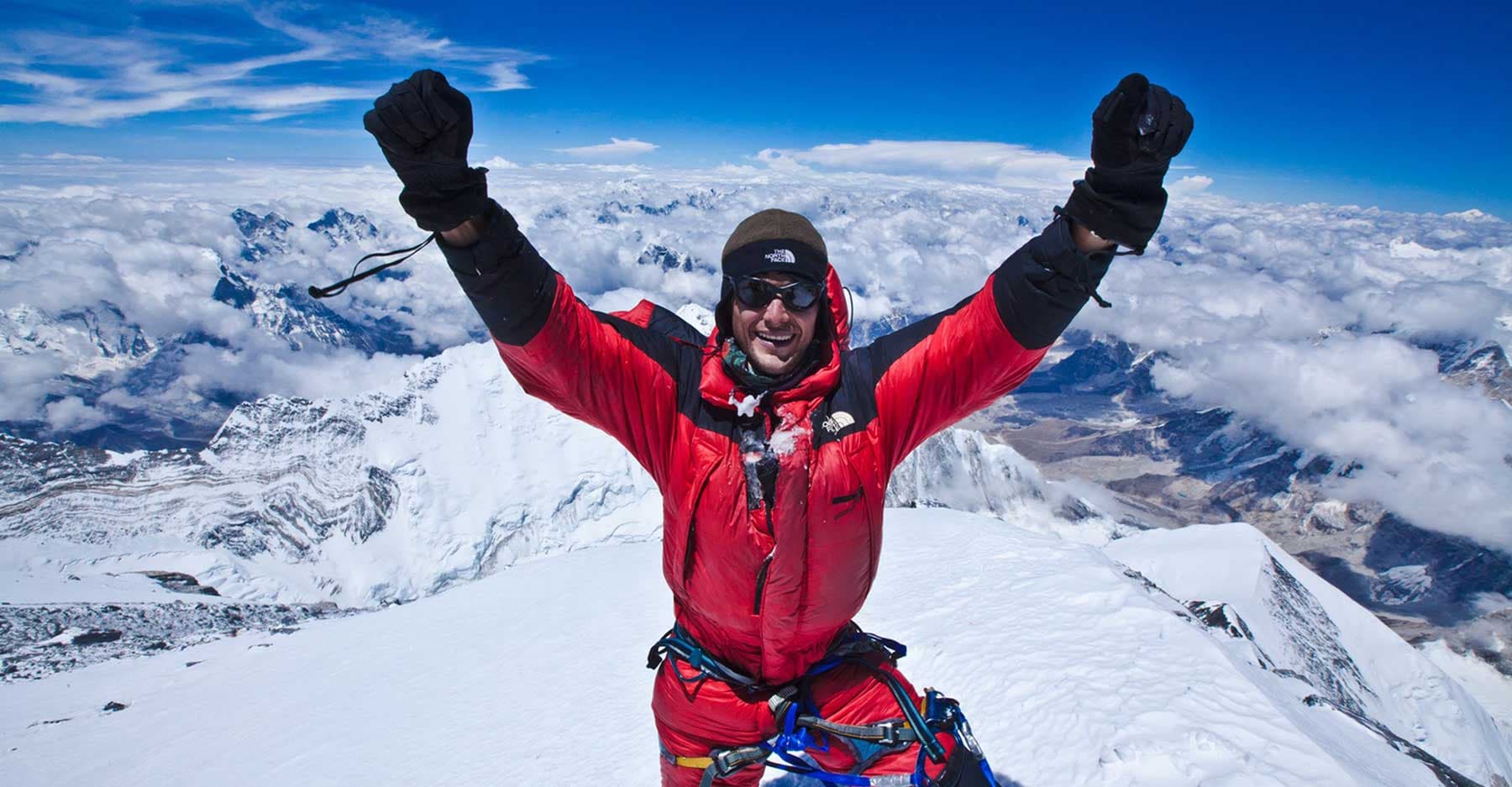 Climber achieving summit